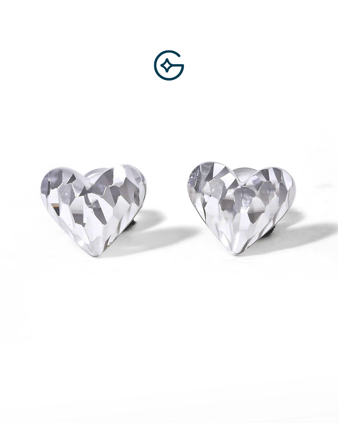 Sharp Textured Heart Studs In Silver