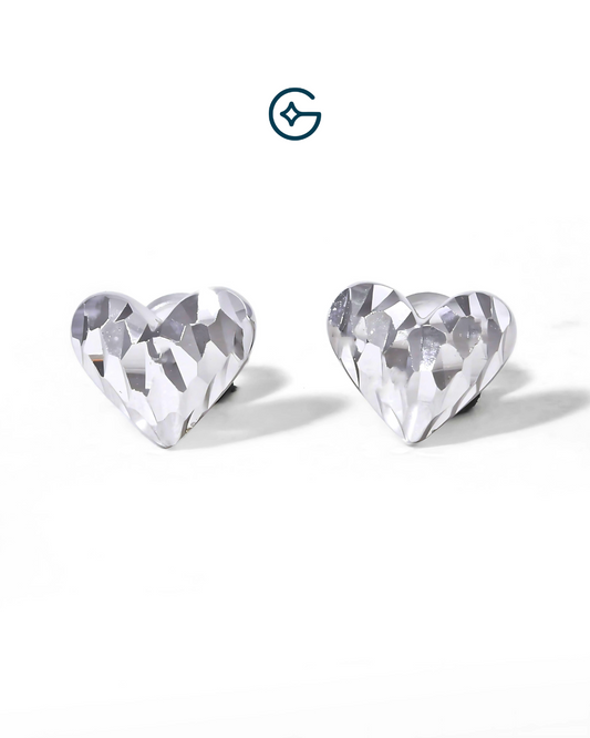 Sharp Textured Heart Studs In Silver