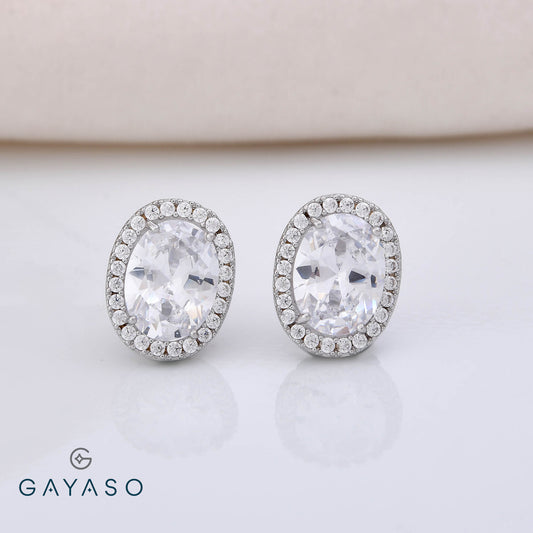Oval Solitare Studs With Halo Setting Studs In Silver